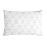 Almohada de salud blanca con puntitos dorados