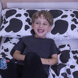 Almohada de salud con patrón de manchas de vaca para niños
