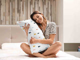 Almohada de salud con gotas de colores