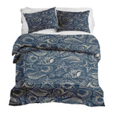 Set de ropa de cama con manta terapéutica azul con conchas