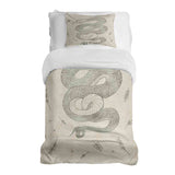 Juego de ropa de cama beige con manta terapéutica y serpiente