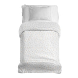 Set de ropa de cama con mantas terapéuticas y delicados ramos de flores