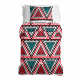Set de ropa de cama con mantas terapéuticas y triángulos coloridos