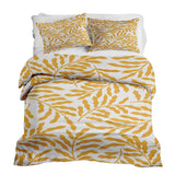 Set de ropa de cama con mantas terapéuticas y ramas amarillas