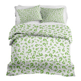 Set de ropa de cama con mantas terapéuticas y signos de interrogación verdes