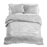 Set de ropa de cama con mantas terapéuticas y hojas de palma grises