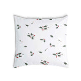 Almohada de salud blanca con ramas de muérdago