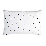 Almohada de salud blanca con puntos dispersos