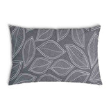 Almohada de salud gris con hojas de palma blancas
