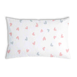 Almohada de salud blanca con pequeños corazones