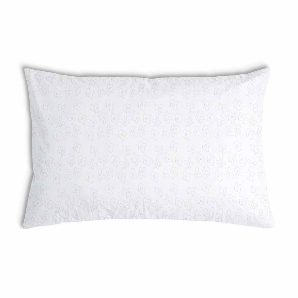 Almohada de salud blanca con delicadas flores