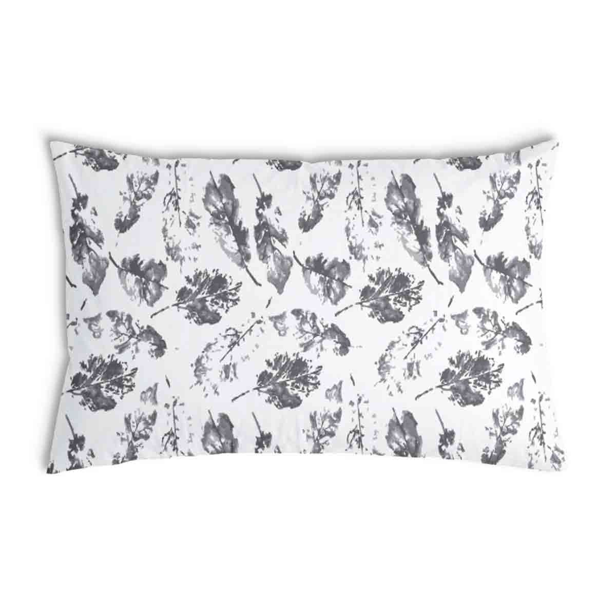 Almohada de salud blanca con hojas grises