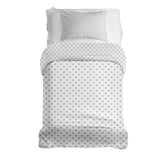 Set de ropa de cama con mantas terapéuticas blancas con delicados cuadros