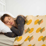 Set de ropa de cama con mantas terapéuticas y formas amarillas