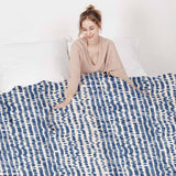 Set de ropa de cama con mantas terapéuticas y puntos azules