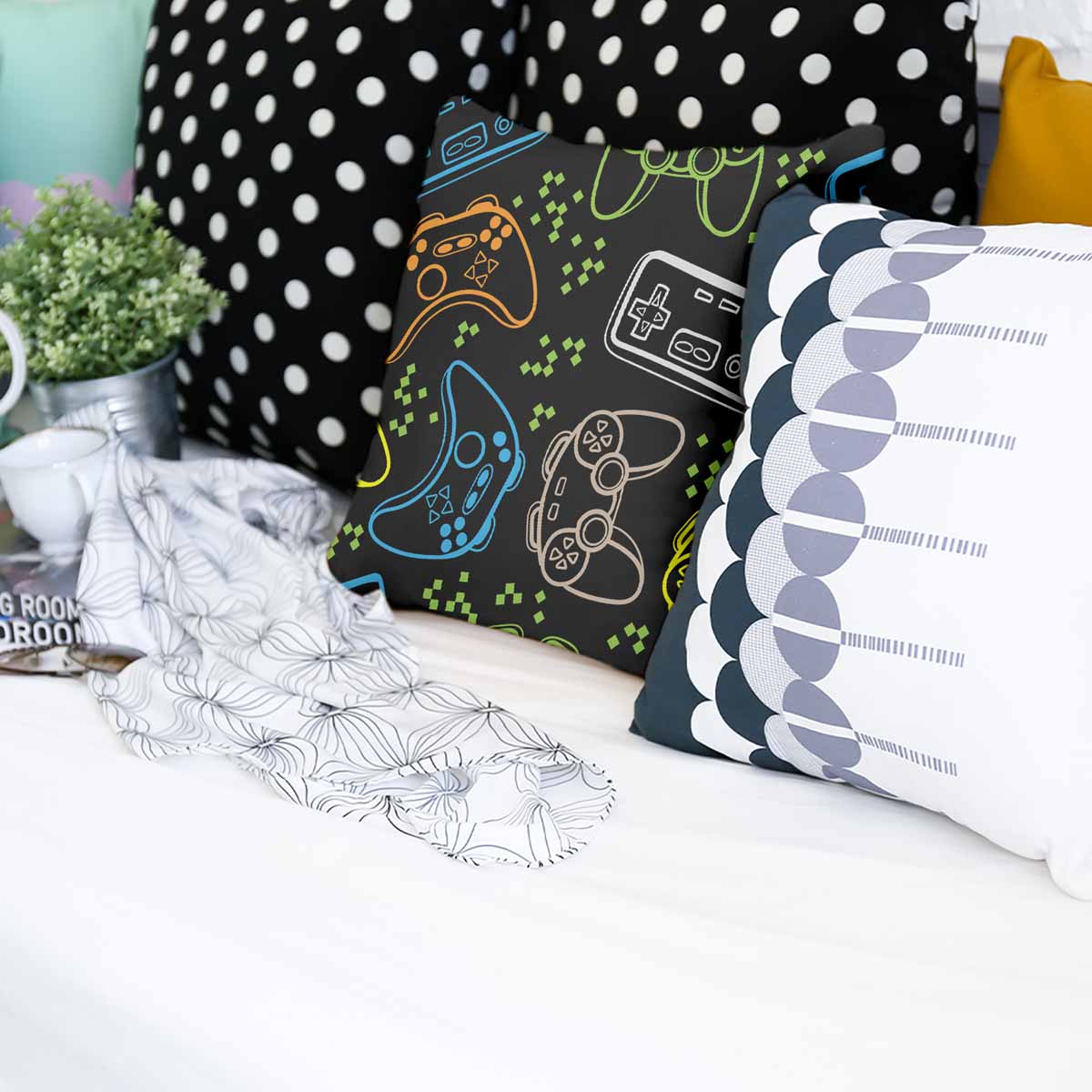 Almohada de salud negra con consolas de juegos