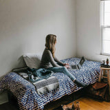 Set de ropa de cama con mantas terapéuticas y puntos azules