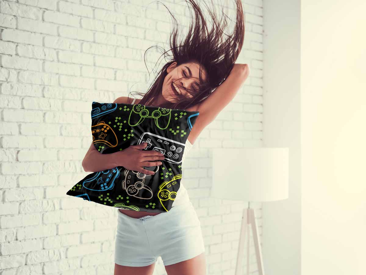 Almohada de salud negra con consolas de juegos