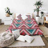 Set de ropa de cama con mantas terapéuticas y triángulos coloridos