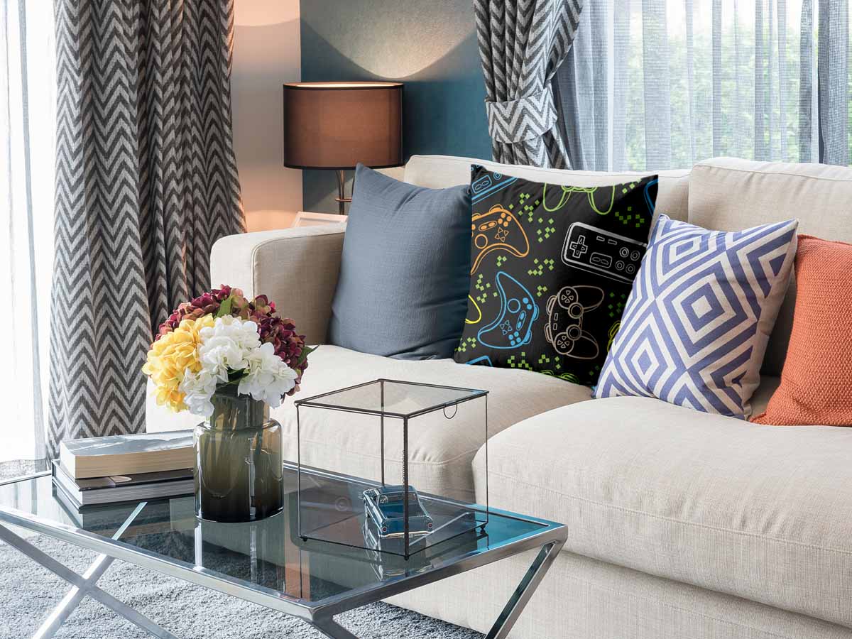 Almohada de salud negra con consolas de juegos