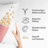 Almohada de salud blanca con palomitas de maíz