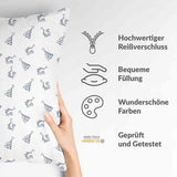 Almohada de salud blanca con pendientes bohemios