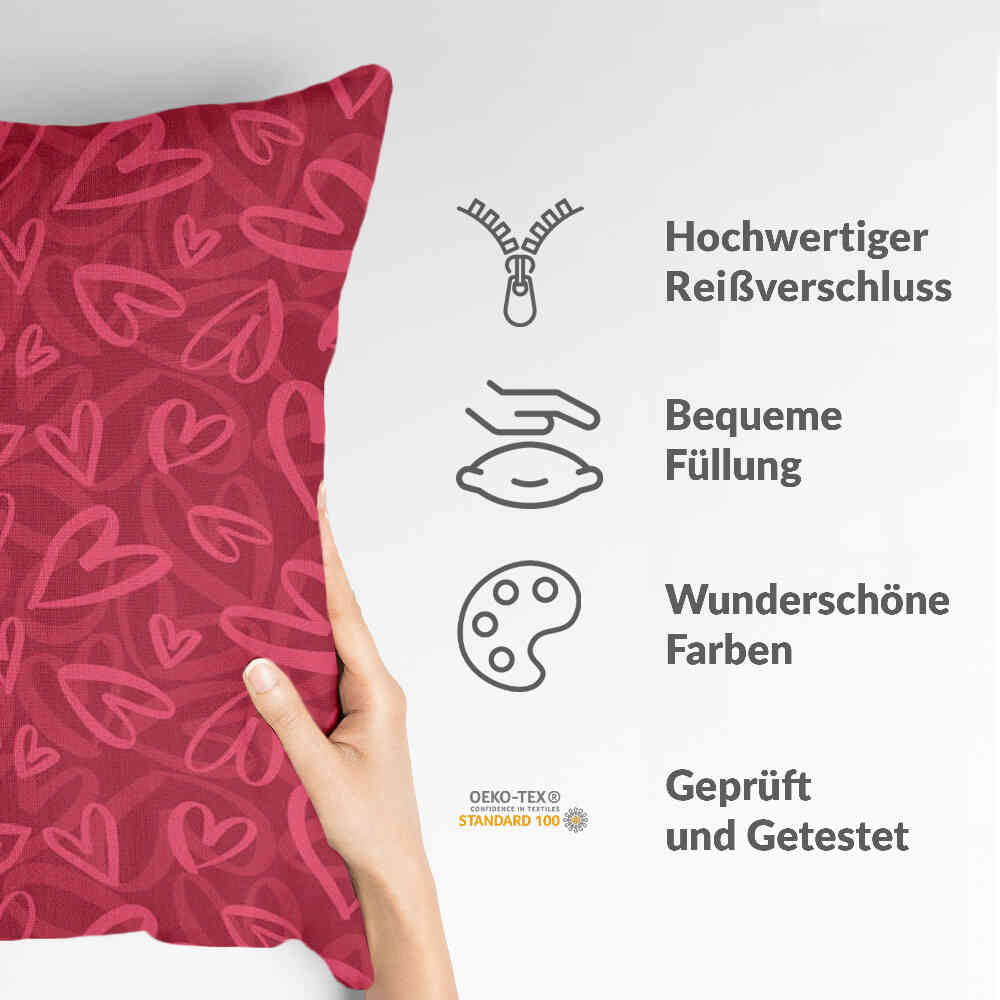 Almohada de salud roja con motivo de corazón rosa