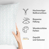Almohada de salud con gotas azules