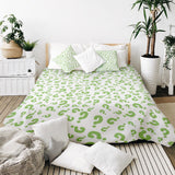 Set de ropa de cama con mantas terapéuticas y signos de interrogación verdes