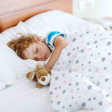 Juego de ropa de cama con mantas terapéuticas blancas con estrellas