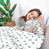 Juego de ropa de cama con mantas terapéuticas y ramas de muérdago
