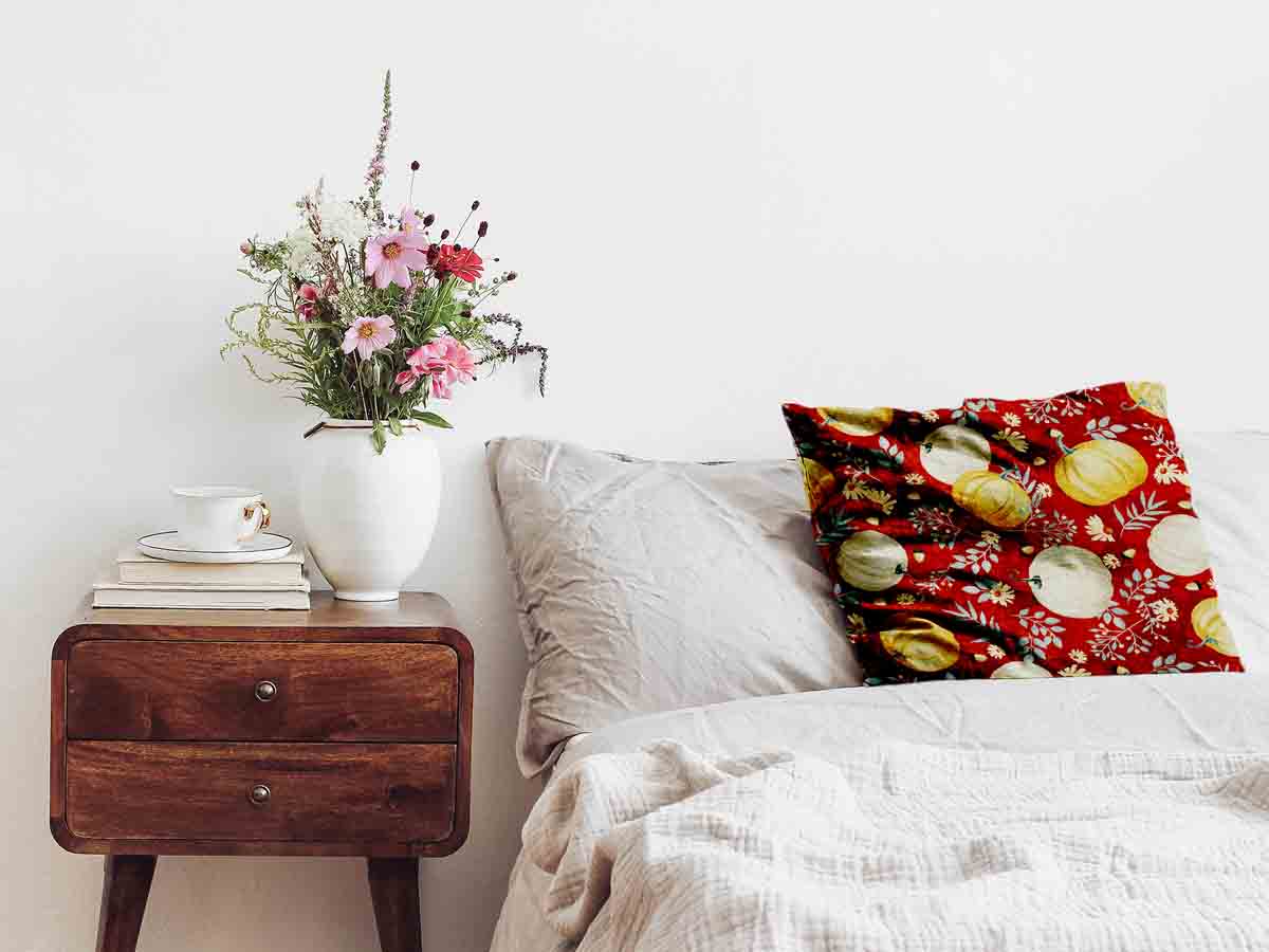Almohada de salud roja con calabazas