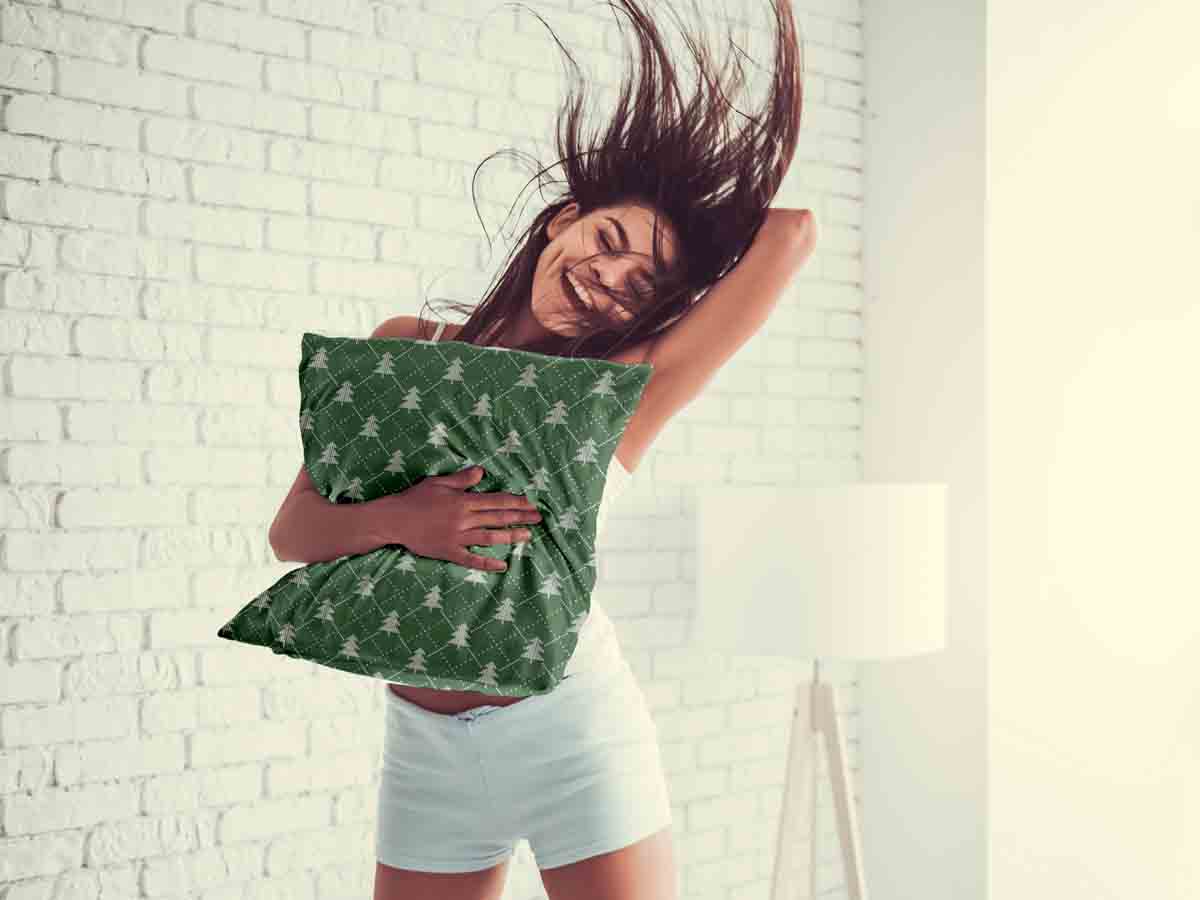 Almohada de salud verde con abetos