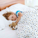 Set de ropa de cama con mantas terapéuticas y pequeños triángulos