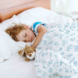 Set de ropa de cama para terapia con mantas blancas y juguetes