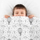 Set de ropa de cama con mantas terapéuticas y globos aerostáticos
