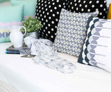 Almohada de salud azul con ondas blancas