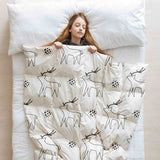Juego de ropa de cama con manta terapéutica blanca con ciervo