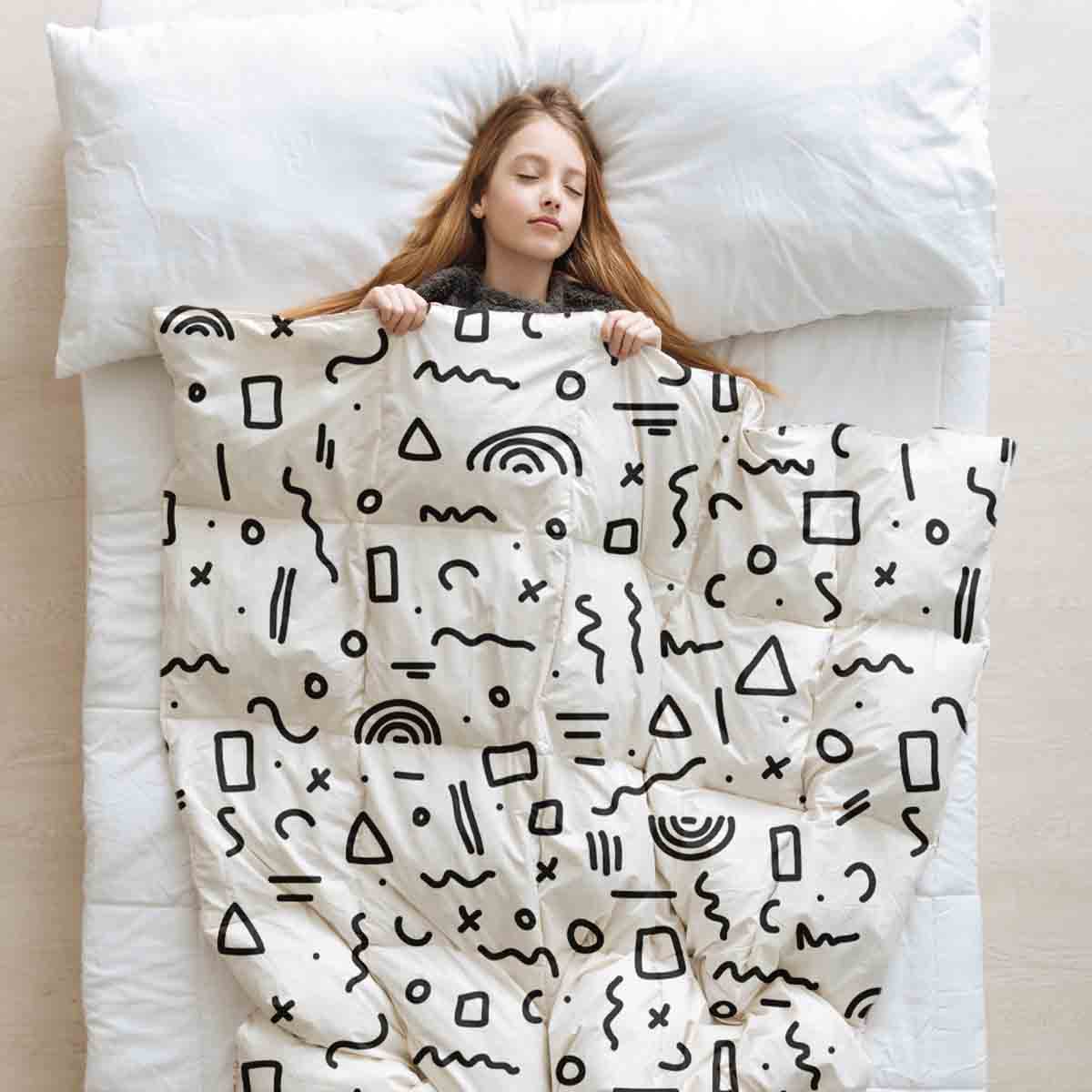 Set de ropa de cama con mantas terapéuticas blanco con formas en negro