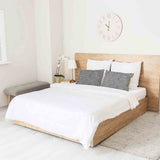 Almohada de salud gris con plantas doradas