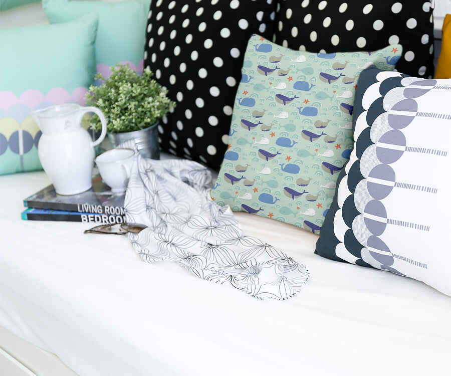 Almohada de salud verde con ballenas