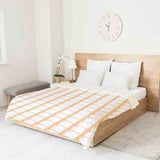 Set de ropa de cama con manta terapéutica amarillo a cuadros
