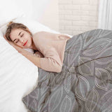 Juego de ropa de cama con manta terapéutica gris con hojas de palma blancas