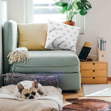 Almohada de salud blanca con copos de nieve grises