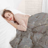 Set de ropa de cama con manta terapéutica gris con plantas doradas