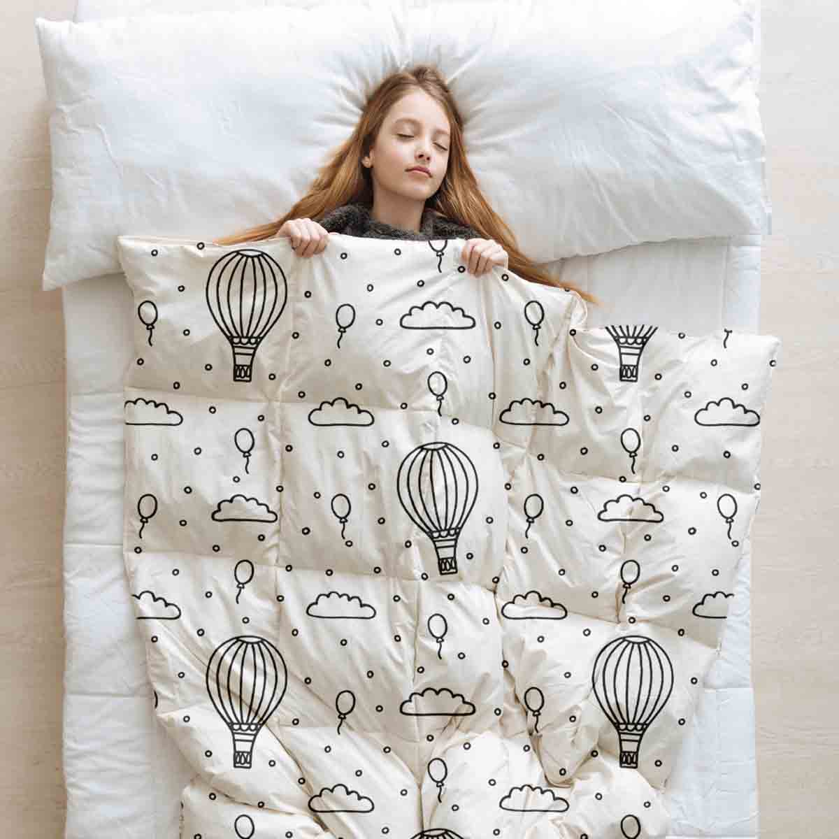 Set de ropa de cama con mantas terapéuticas y globos aerostáticos