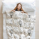 Set de ropa de cama con mantas terapéuticas y globos aerostáticos