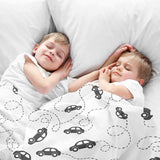 Set de ropa de cama con mantas terapéuticas y autos negros