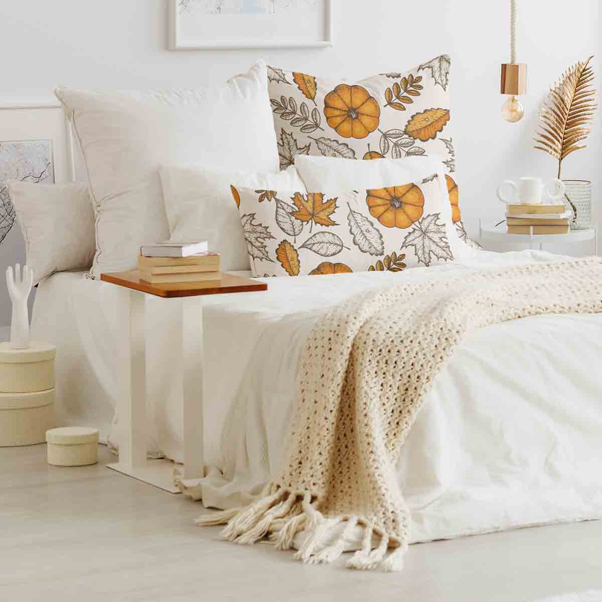 Almohada de salud blanca con hoja y calabaza