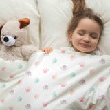 Set de ropa de cama con manta terapéutica blanca con patas de colores